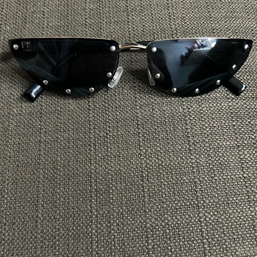 Sunglasses they have a dark tint can be used to make any outfit pop out